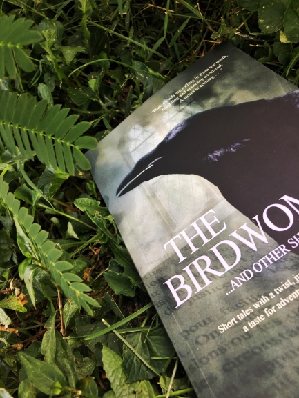 Book, The Birdwoman by A.R. Geiger and leaves